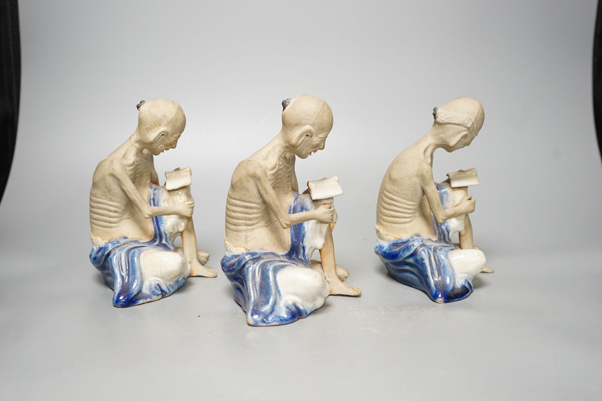 A set of three Shiwan pottery figures of Inohan, 17cm